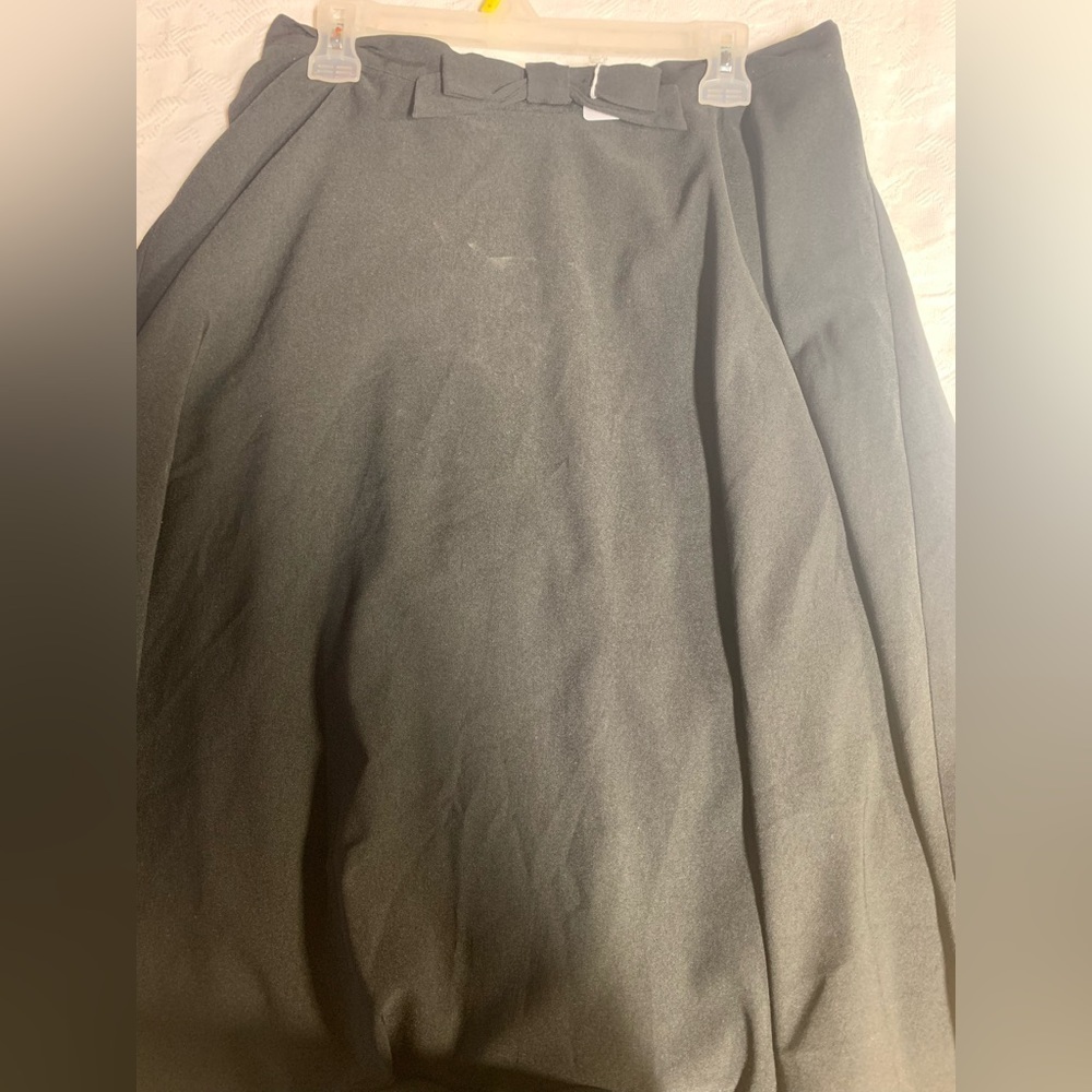Women’s black bow skirt
